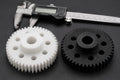 CNC-machined POM and Nylon robot gears side by side